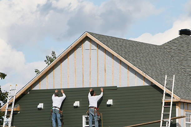 Professional Siding Installation technician working in Carrollton, KY